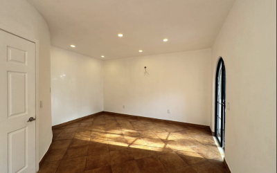 #106 Puerto Morelos - Regatta 3 BD 4 BA Condo - bedroom with arched doorway to outside