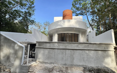 #106 Puerto Morelos - Regatta 3 BD 4 BA Condo view of the exterior back of the house