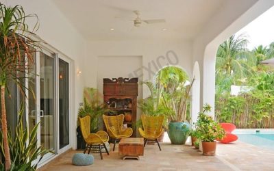 #114 Riviera Maya single family home with covered patio lounge area next to the pool