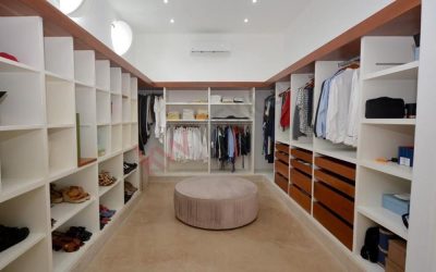 #114 Riviera Maya single family home with large walk-in closet featuring custom cabinetry