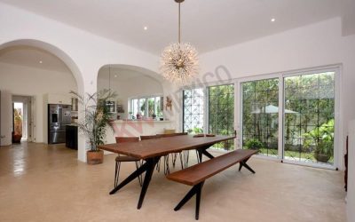 #114 Riviera Maya single family home with spacious airy dining room with slider out to the garden