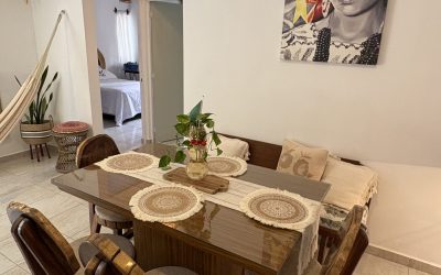 #38 Puerto Morelos - Selva Escondida view of the dining room and living room with luxury finishes from the front doorway