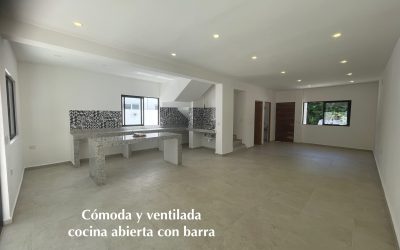 #40 Puerto Morelos - Aldea Umm kitchen with beautiful finishes and kitchen island flows effortlessly into the open concept floor plan