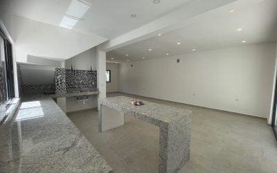 #40 Puerto Morelos - Aldea Umm view of open floor plan living and dining areas from the kitchen