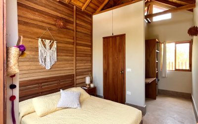 Botique Hotel Holbox bedroom with king size bed built in closet and work areas and en suite bathroom