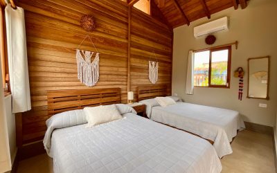 Botique Hotel Holbox comfortable bedroom with air conditioning and ceiling fan