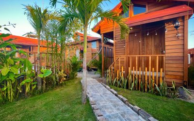 Botique Hotel Holbox paved walkways and tropical plants between guest cottages