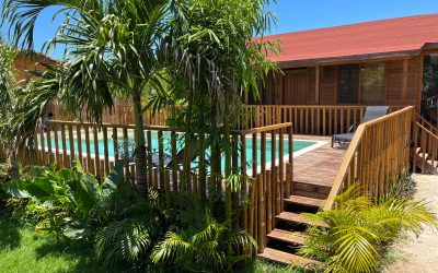 Botique Hotel Holbox pool area with lush tropical plants and stair access close to hotel rooms